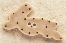 Leaping Bunny with Dots facing left button by Debbie Mumm